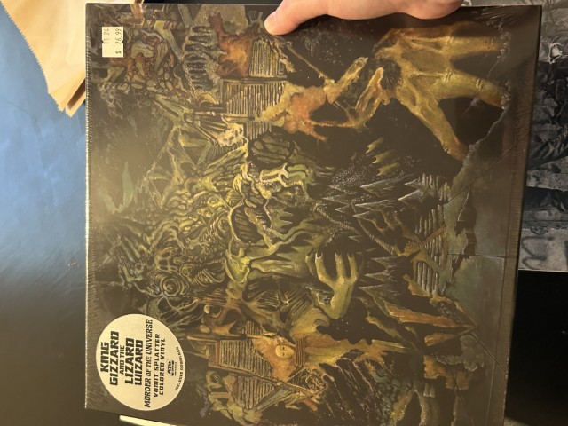 Cover of King Gizzard And The Lizard Wizzard's album Murder of the Universe on vinyl.